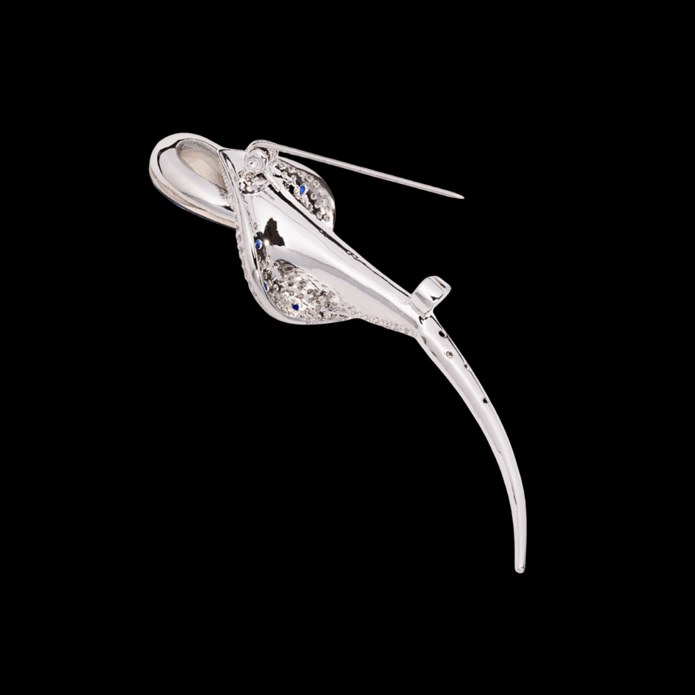 AVELIA silver calla lily brooch featuring a large lavender teardrop crystal and a encrusted petal on a long curved stem.